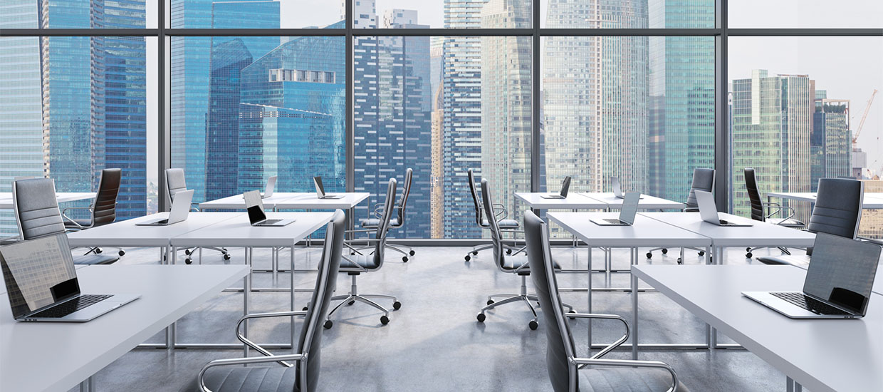 Workplaces in a modern panoramic office, Singapore city view from the ...